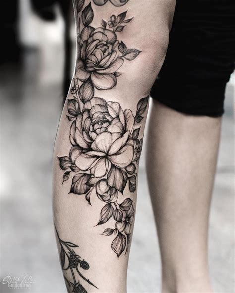 floral thigh tattoos